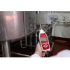 Basic sound level meter being used in a factory.